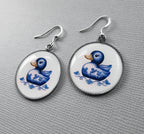 Douceur Nautique: Boucles d'Oreilles Canard en Faïence