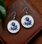 Douceur Nautique: Boucles d'Oreilles Canard en Faïence