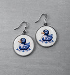 Douceur Nautique: Boucles d'Oreilles Canard en Faïence